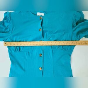 TWIST FRONT SHORT SKIRT STANDING OVATION